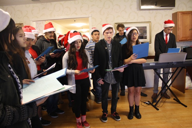 Jackelyn Gorski and her Choir Class perform holiday songs for the elderly at the Lake Balboa Care Center. Photo by Rusel Ramirez 