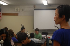 Photo by Angelo Marmol. Science teacher Mabel Wong explains a concept to her class.