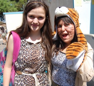 Freshmen Lissa Favela and Juliette Tafoya were among those dressed in animal prints and face paint  for Spirit Week's In The Jungle theme on Wednesday. The theme on Thursday is Superheroes vs. Supervillains and Friday is Fancy Schmanzy Day. Photo by Daniela Valdivia. 