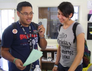 Photo by Dion Mazor. Student Body President Michella Mousaed (right) and Vice President Waldir Henriquez (left) do the daily morning annoucements.