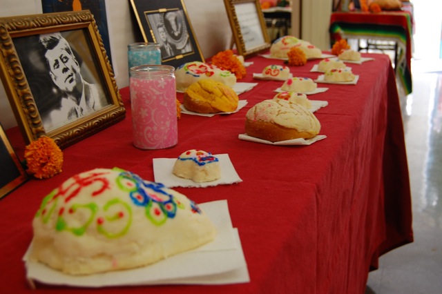 Students in the Leadership Class set up this altar honoring President John F. Kennedy on the 50th anniversary of his assassination. One student also created the sugar skulls that adorn this altar. 