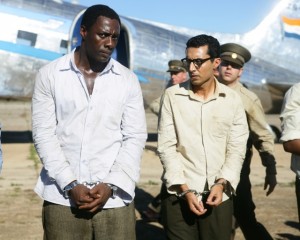 Idris Elba and Riaad Moosa star in "Mandela: Long Walk to Freedom." Photo by The Weinstein Co. 