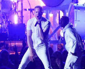 Imagine Dragon's lead singer, Dan Reynolds (left), and Kendrick Lamar (right) pump up the audience with their electric performance. Photo by grammy.com.