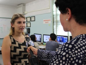 Senior Editor-in-Chief Natalie Moore is interviewed by ABC 7 News Reporter Adrienne Alpert on Tuesday, Sept. 23 for a story covering The Pearl Post honor of being a 2014 Pacemaker Finalist, put on by the National Scholastic Press Association. Photo by Jake Dobbs.