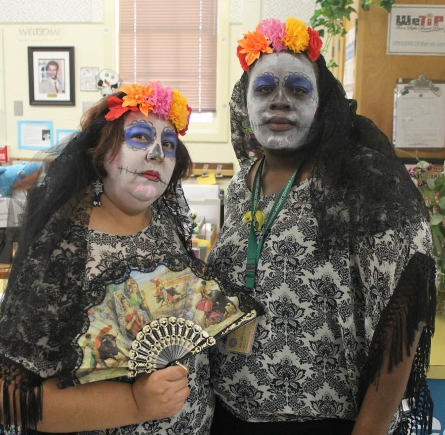 Lupe Osorio and Ms. Madge drew inspiration from Day of the Dead for their Halloween costume. 