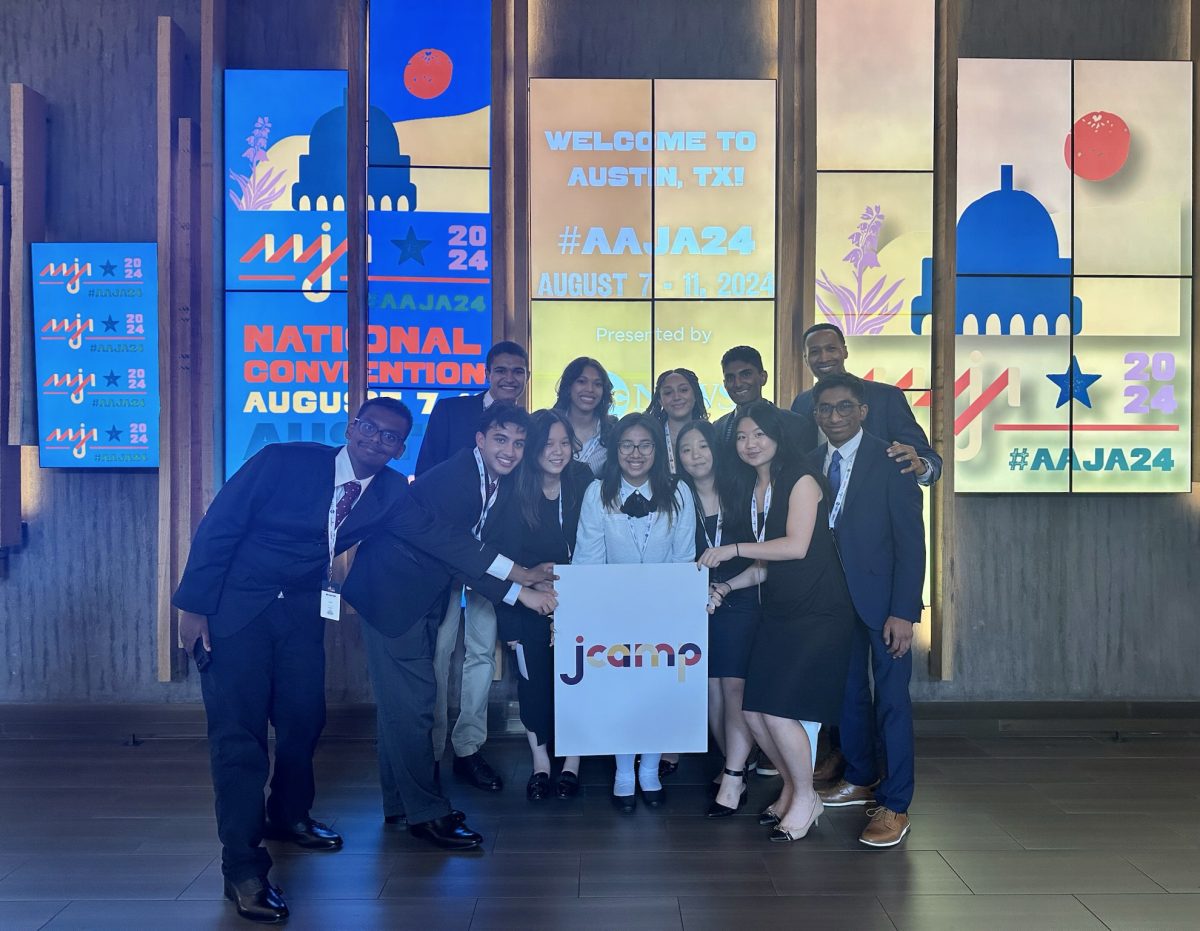 Junior Jenny Marquez poses at AAJA's National Convention with her JCamp student journalist cohorts and ABC 7 Chicago Eyewitness anchor Terrell Brown on Aug. 8. 