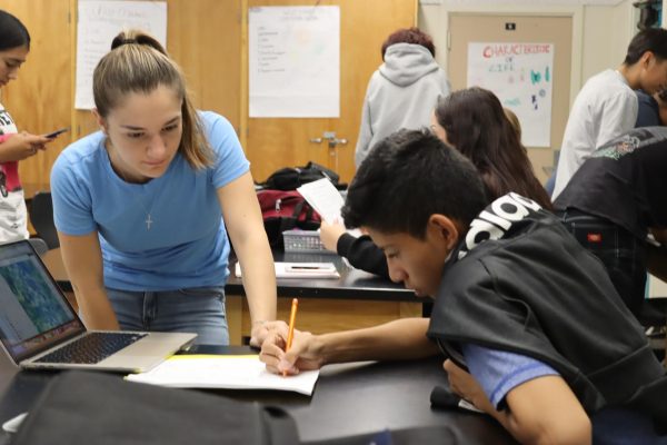 Science teacher Ani Zohrabyan helps out freshman Brandon Gomez in her period 4 biology class on Aug. 29. 