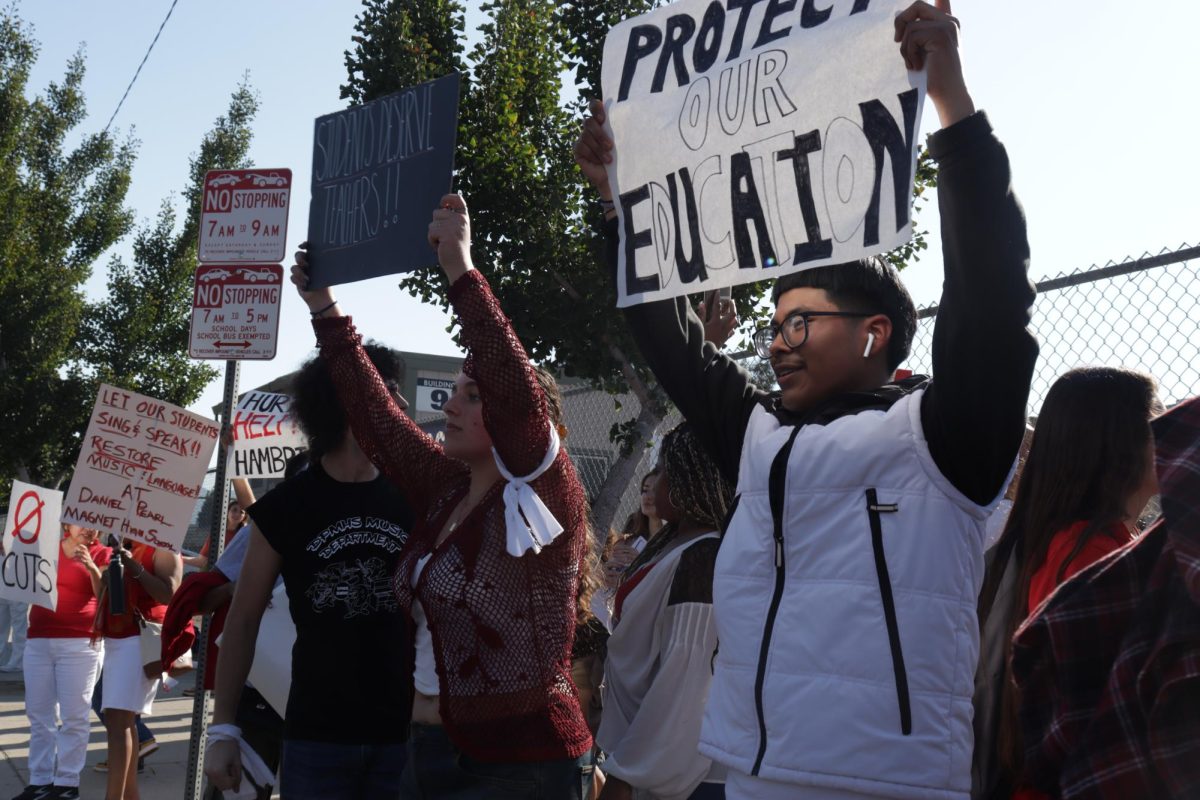 Students walked out of their sixth period on Sept. 23 to protest for the reinstatement of their teachers following the displacement of music teacher Wes Hambright and Spanish teacher Glenda Hurtado. Students demanded the return of both teachers' positions, as without them, their respective departments would shut down.