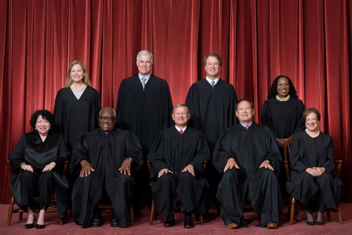 On June 30, 2022, Justices gathered for a formal group photograph of the Supreme Court after Justice Ketanji Brown Jackson joined the Court. The Justices are posed in front of red velvet drapes and arranged by seniority, with five seated and four standing.