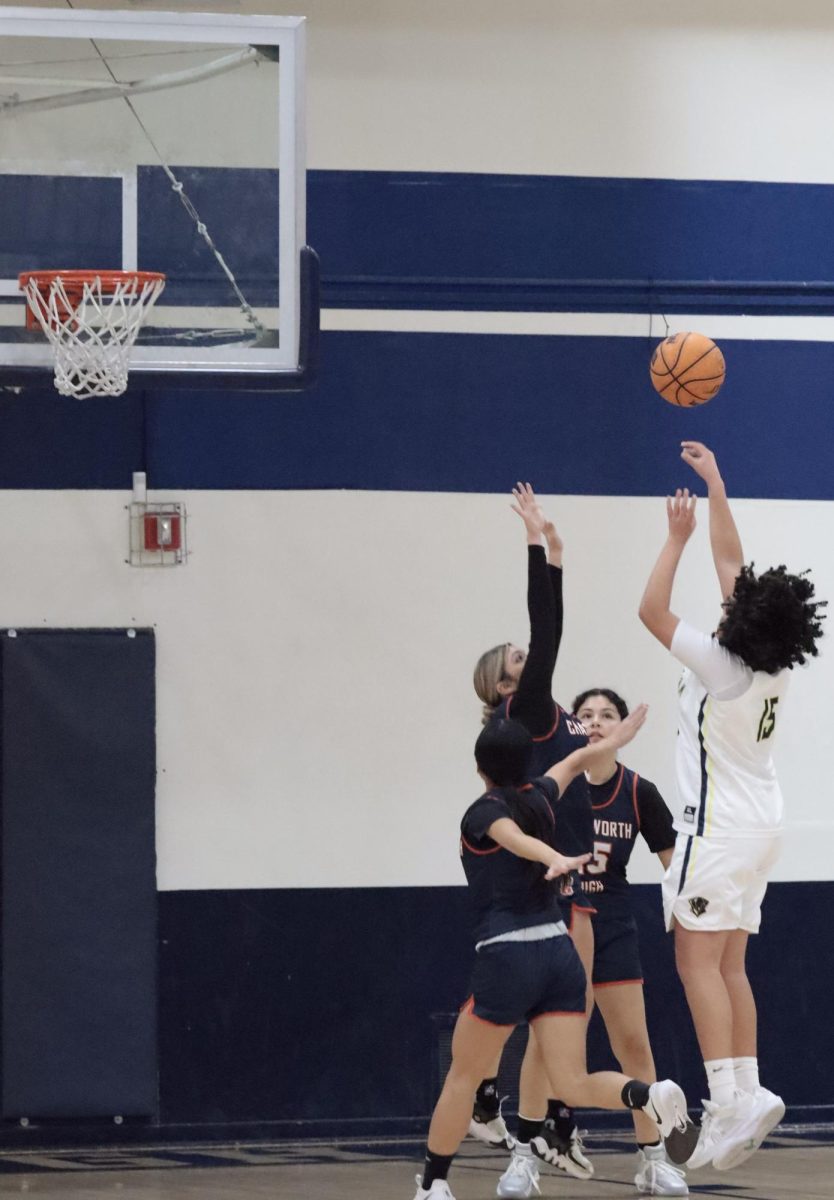 Sophomore Andrea Arosemena shoots a ball during her Junior Varsity basketball game against Chatsworth High School on Jan. 29. 