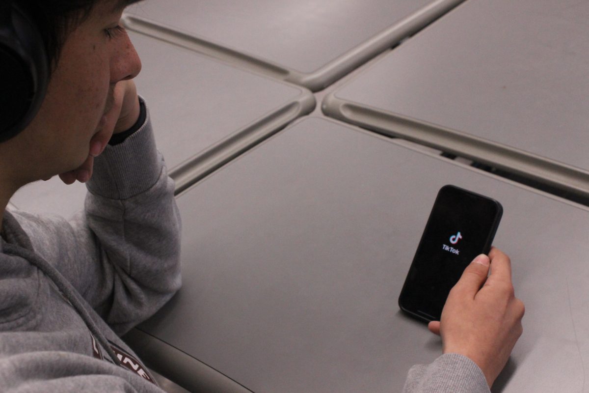 Freshman Brenden Rosenthal opens the TikTok app during his period 2 Photography class on Jan 31. TikTok was set to be banned on Jan. 18 but President Trump shortly issued an executive order postponing the TikTok ban's enforcement for 75 days.